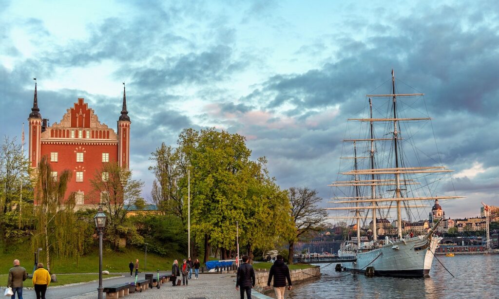 People working by water in the street of sweden: a country that accept autistic people