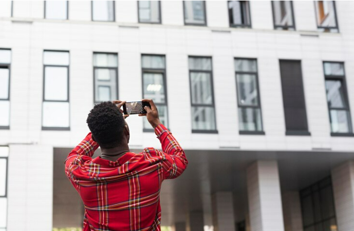 Man looking at his home and wondering what effect a change of address has on his passport