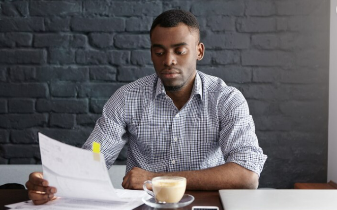 Man gathering documents for change in address when the address on Passport is different from current address