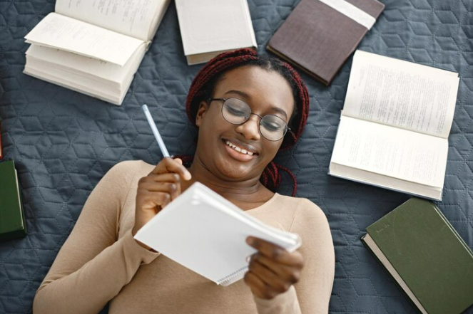 A woman laying on her bed checking the validity of birth certificate and passport